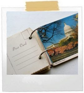 A hole punch and metal rings can transform your postcards into a travel book.