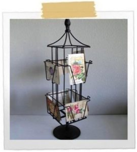 Keep your eyes open for unusual items to display your postcards.