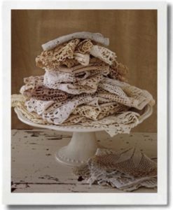 Display doilies stacked on a cake stand.