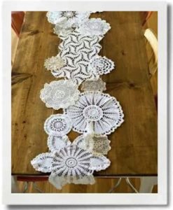 Stitch doilies together to make a table runner.