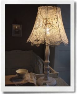 With a needle and thread or glue gun, you can turn a drab lamp shade into something wonderful.