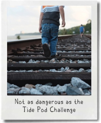 Risks associated with railroad tracks are not as severe as with the Tide Pod challenge.