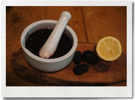Muddle 6 blackberries with 1/2 c Sage Simple Syrup. Cut a lemon in half and squeeze juice into muddled blackberries.